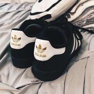 Black Adidas Superstars